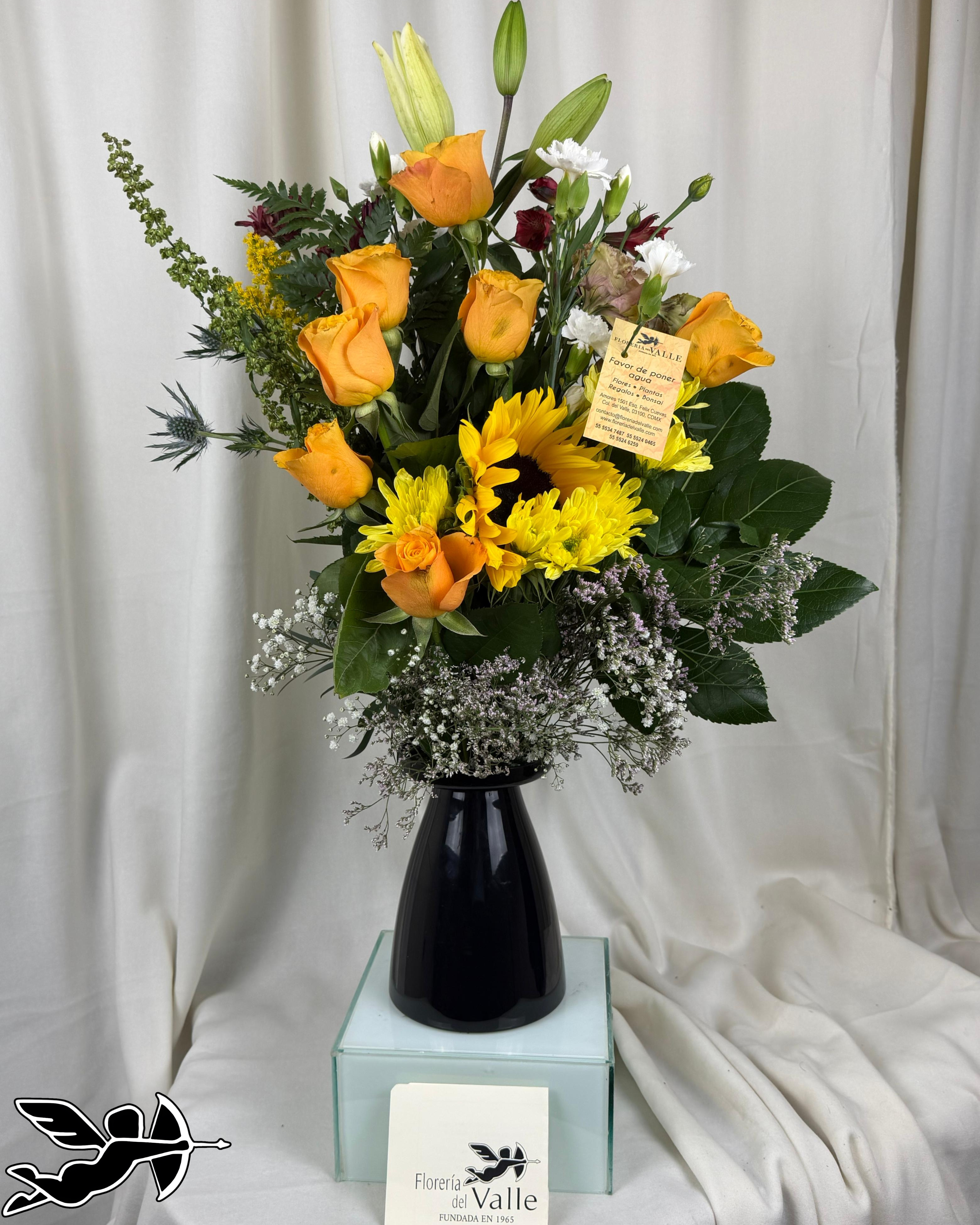 Arreglo ceramica con flores mixtas